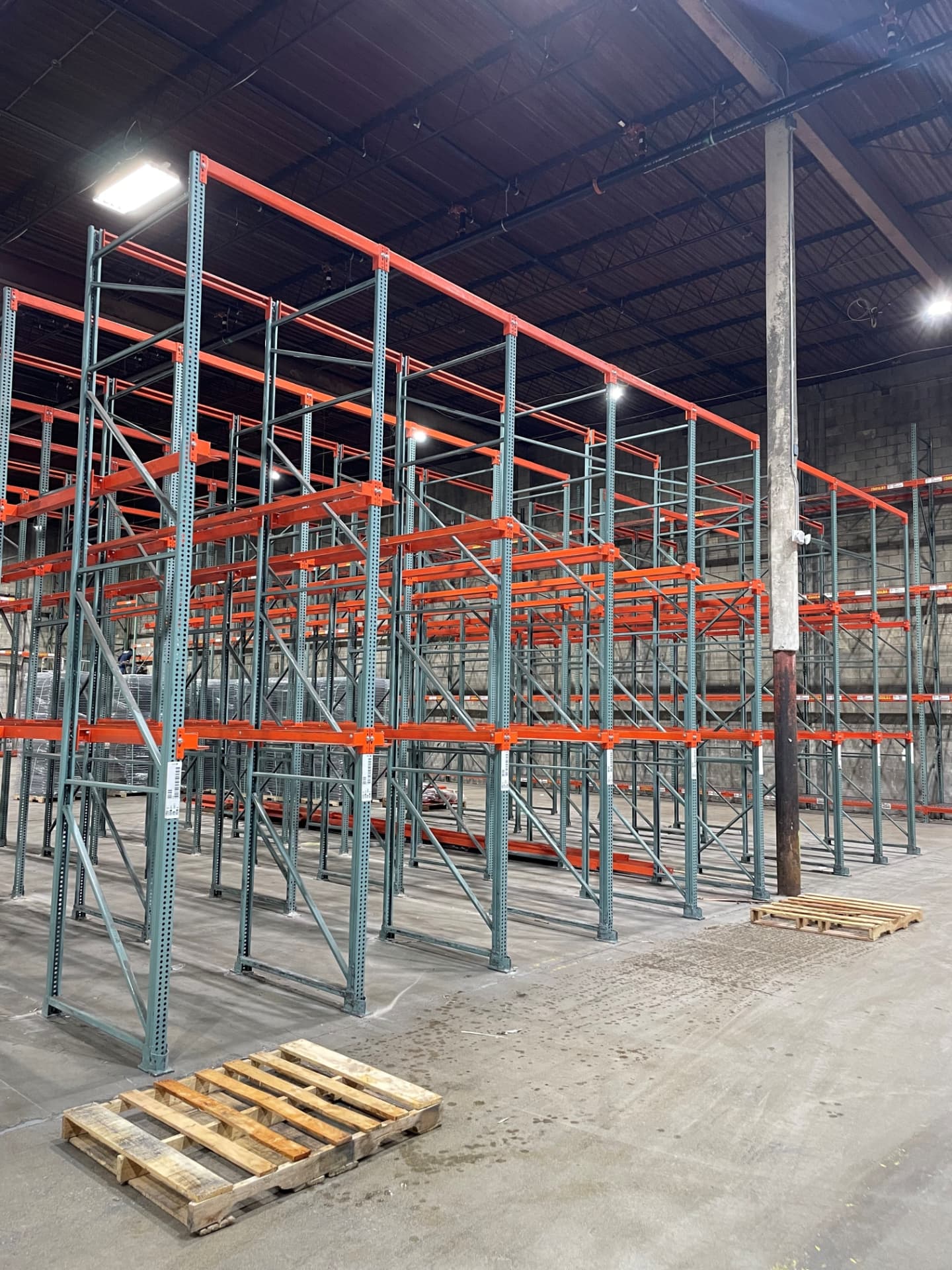 Drive-in pallet rack installation in a warehouse