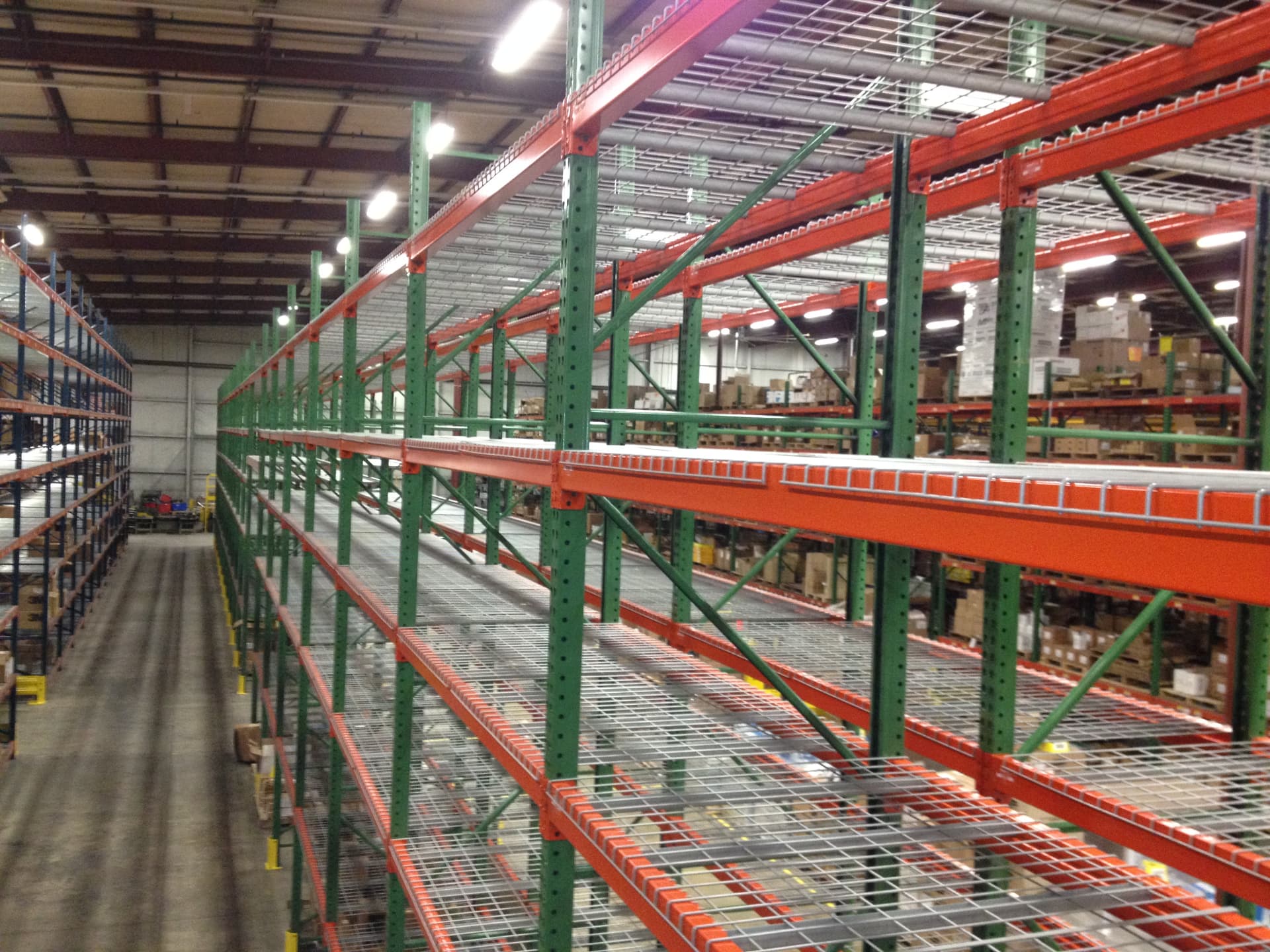 Warehouse aisle lined with selective pallet racking