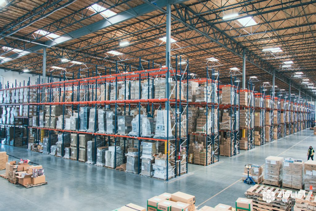 Rows of industrial pallet racks loaded with pallets in a Phoenix warehouse